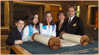 Jewish family at Torah